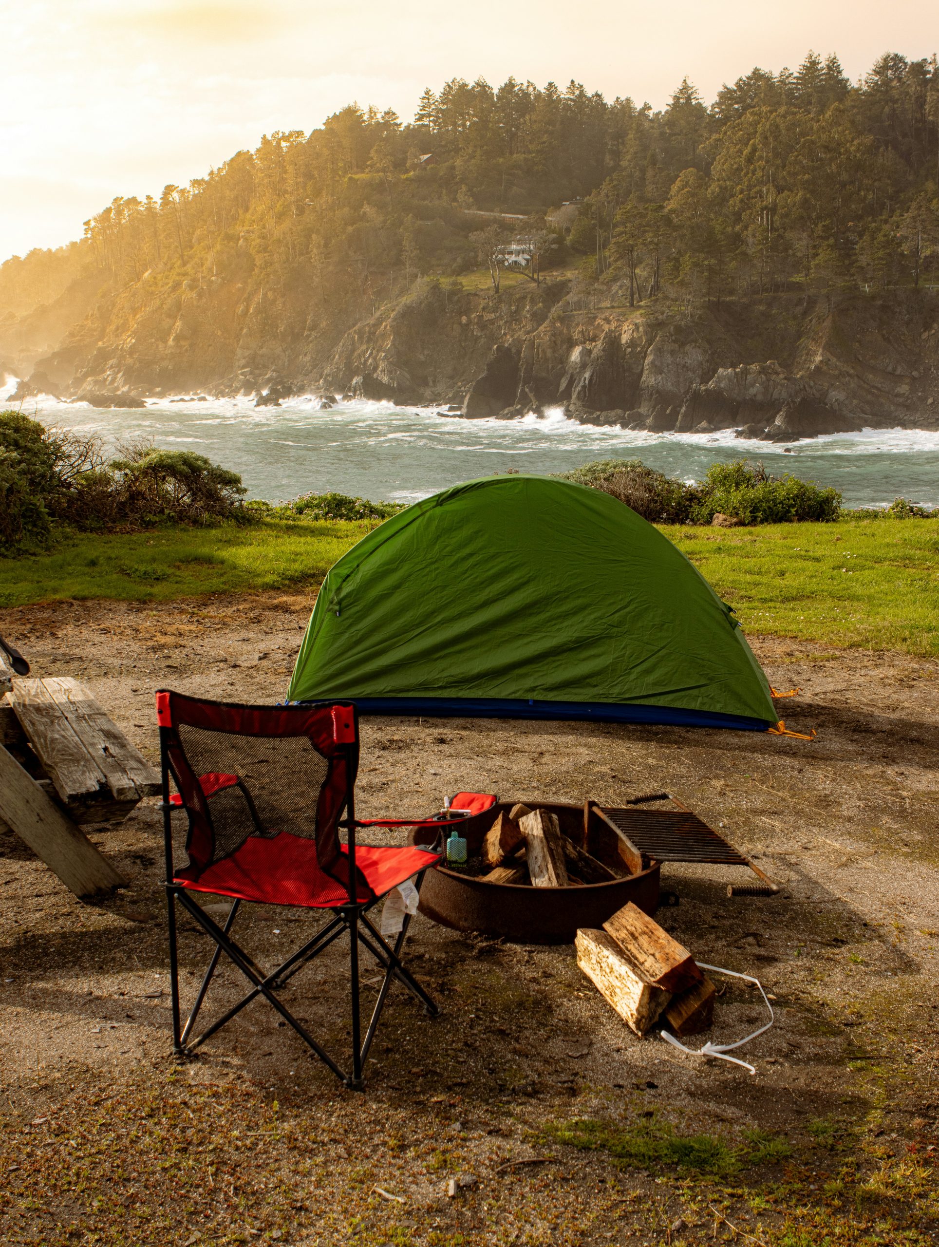 Camping tent A tent next to the water - maybe they brought solar panel for camping tent