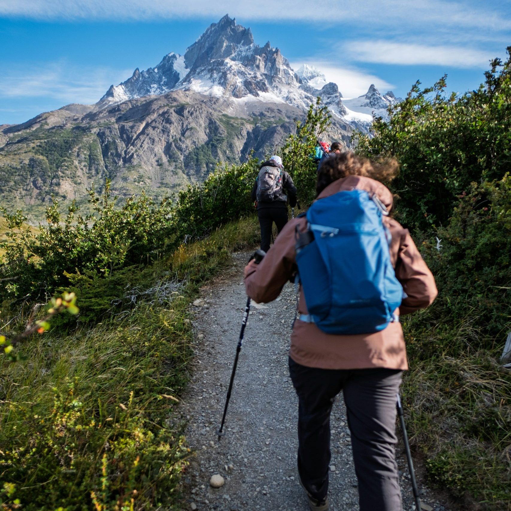 A group hiking. Check out what hiking solar panel can do for you.