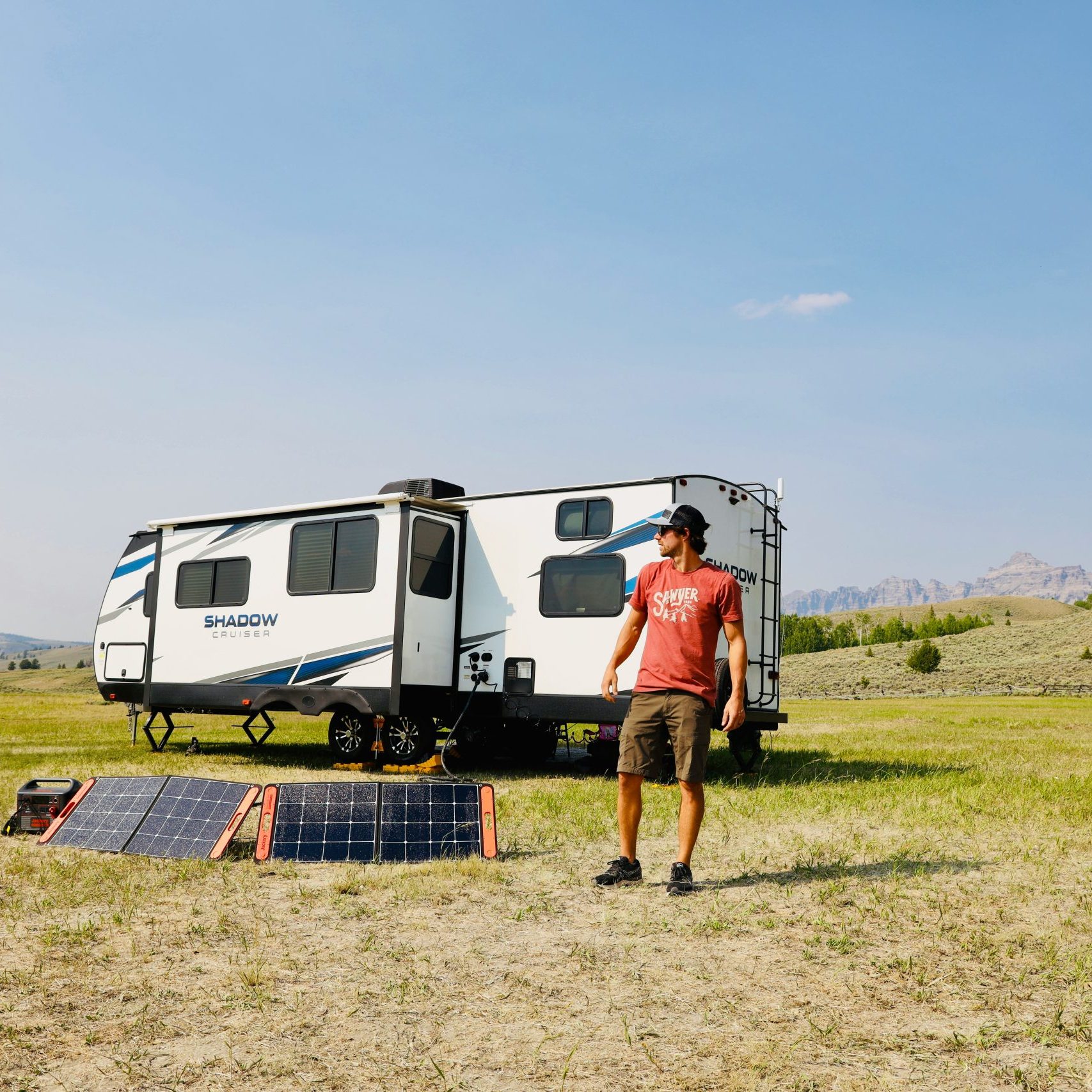 Caravan solar panels and a happy man