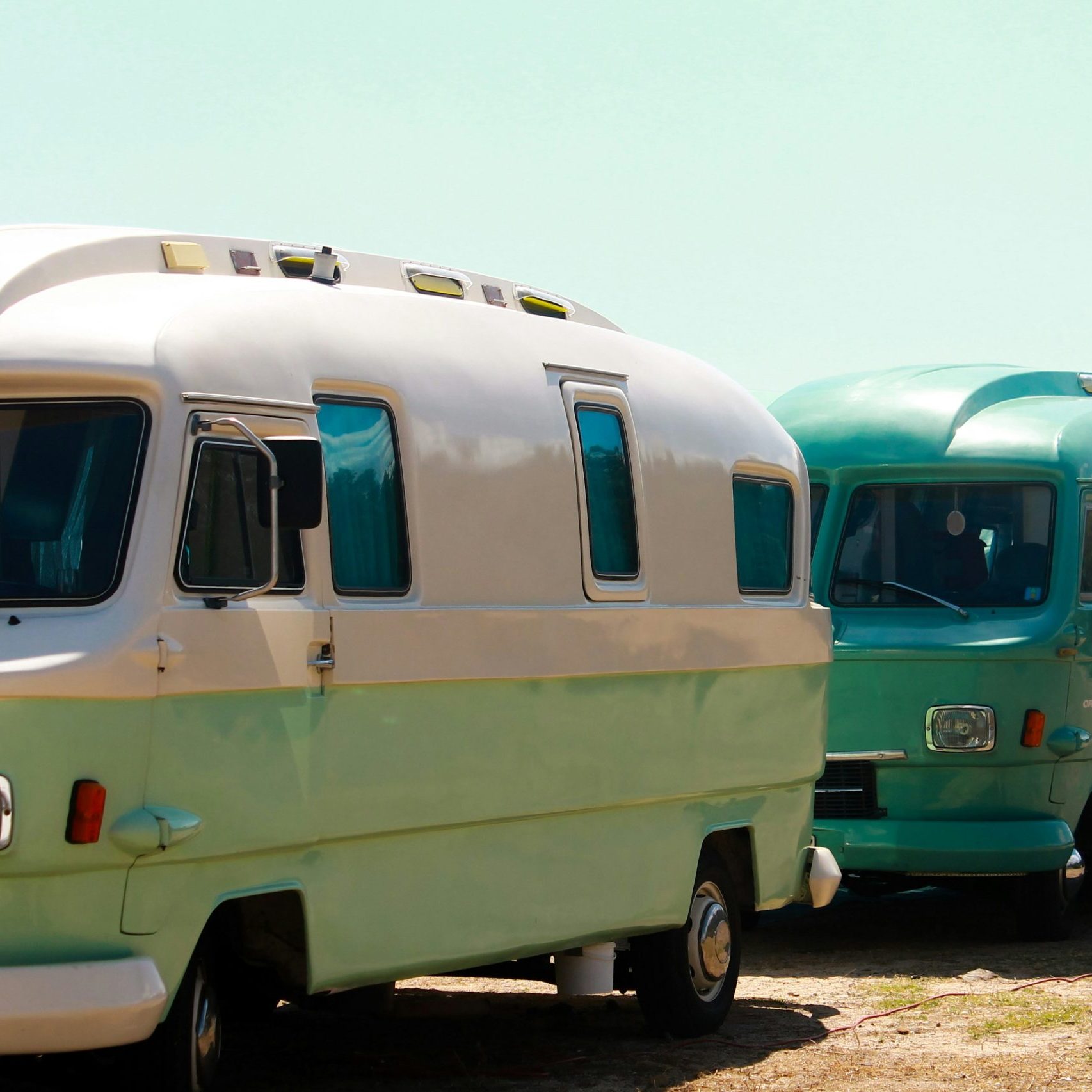 Camper vans on a line