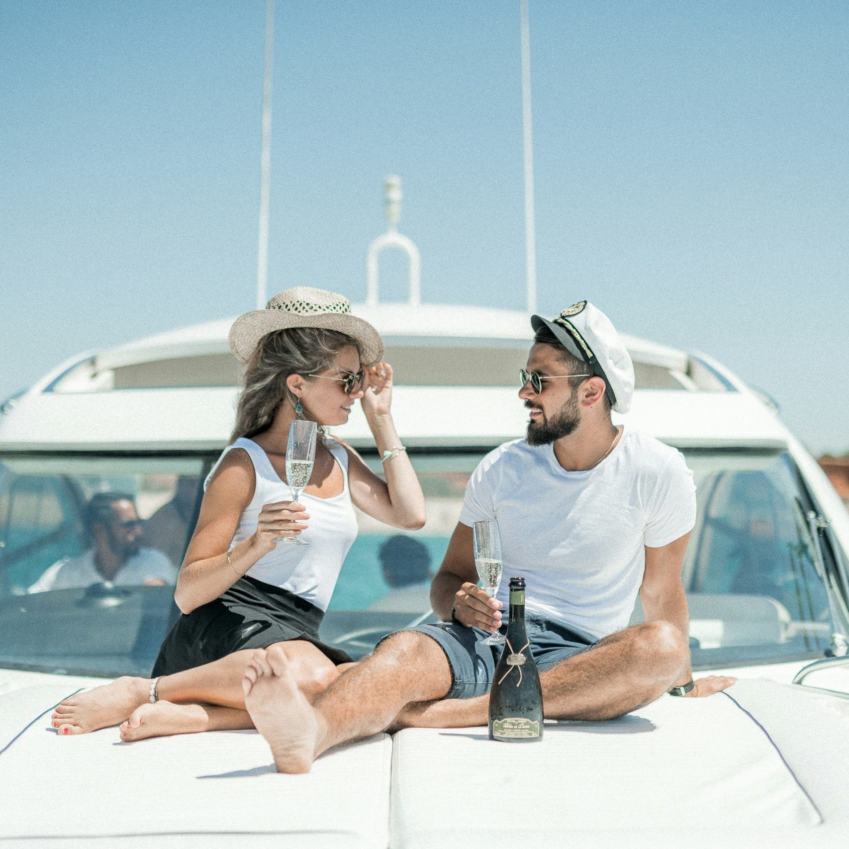 luxury on boat A couple on the front of a boat enoying life. They stay longer with solar boat panels